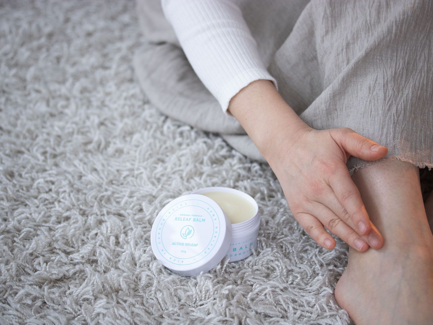 Releaf Balm Applied to Ankles
